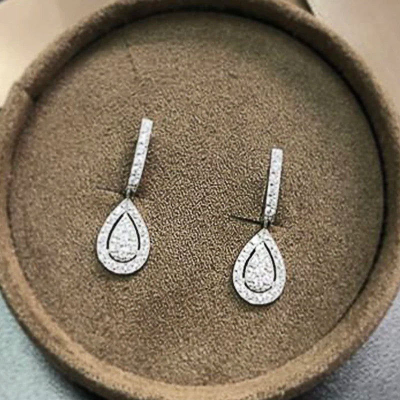 Huitan Silver Color Pear Shaped Drop Earrings for Women Full Paved White Cubic Zirconia Delicate Girl Earrings Statement Jewelry