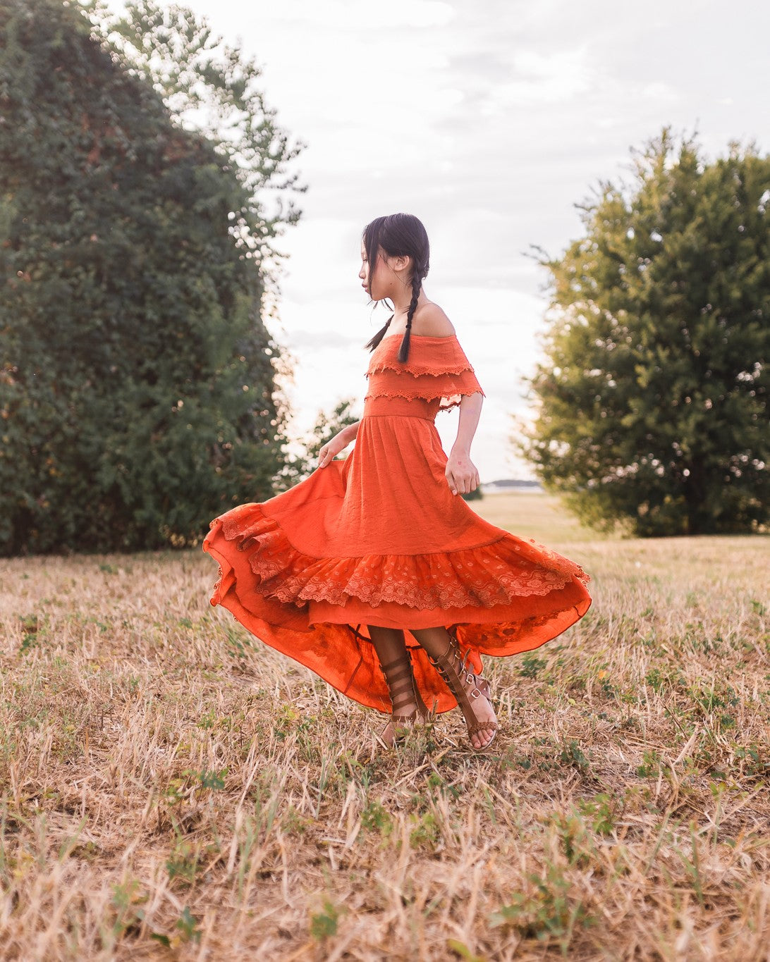 https://www.belleandkai.com/cdn/shop/products/fall-flower-girl-dress-burnt-orange_2400x.jpg?v=1666378142